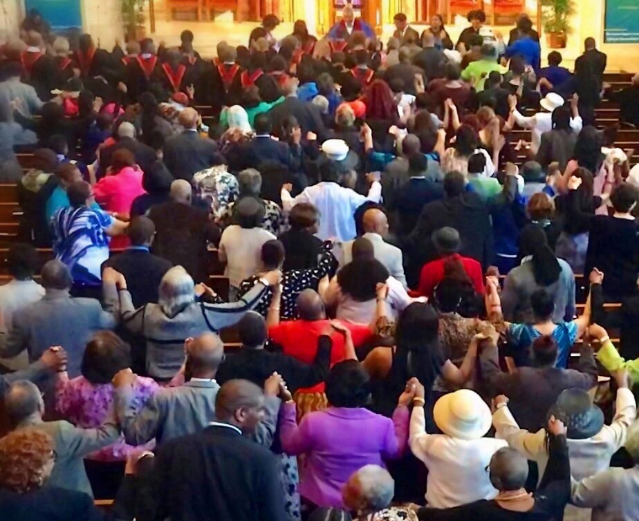 Prayer and worship at Concord Baptist Church